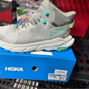 Hoka Men’s Gray Sneaker with Teal Accent and Blue Outsole